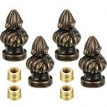 A set of six brass knobs with gold metal inserts.