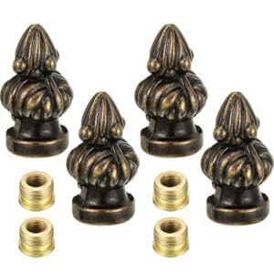 A set of four brass knobs with two pairs of brass inserts.