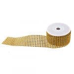 A roll of gold ribbon with many rows of gold beads.