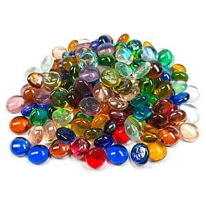 A pile of colorful glass pebbles on top of each other.