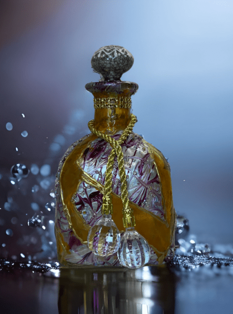 A bottle of perfume sitting on top of a table.