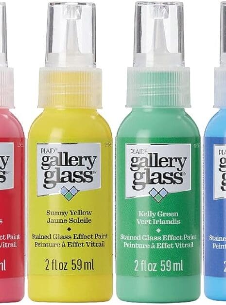 A group of four bottles with different colors.