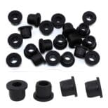 A group of black rubber parts sitting next to each other.