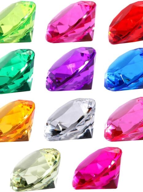 A group of different colored diamonds sitting next to each other.