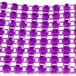 A purple background with many small circles of plastic.