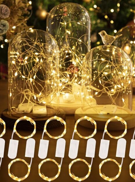 A table with many jars and lights on it