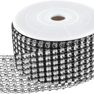 Roll of Bling Ribbon Silver partially unspooled, displaying multiple strands of clear beads on a white backing.