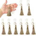 A collage of images showing multiple views of a hand holding a golden Tassels and several golden Tassels displayed on a white background.