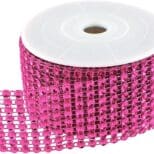 A roll of pink ribbon with a white spool