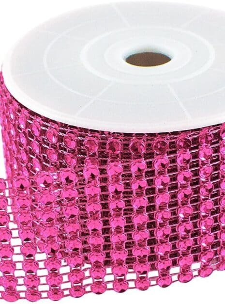 A roll of pink ribbon with a white spool