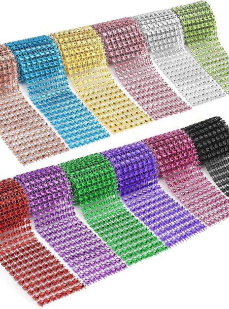 A group of different colored rolls of rhinestone tape.