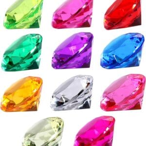 A collection of colorful, multi-faceted Acrylic gemstones 1” in various shapes and hues, displayed on a white background.