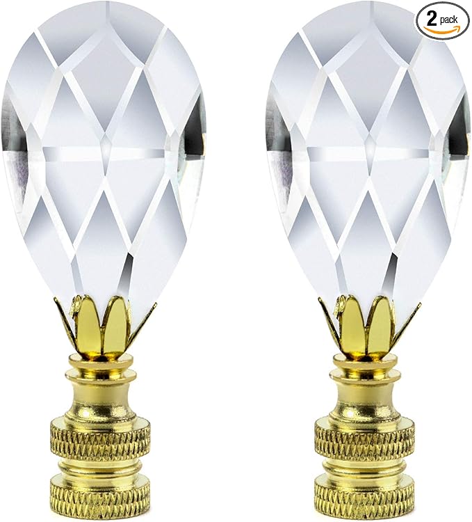 Pair of elegant crystal lamp finials with brass bases.