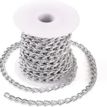 A spool of shiny silver chain links.
